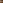 Jack Holden in KENREX. A person with short blonde hair wearing a white shirt holds a microphone to their mouth and hunches the other shoulder up, clenching their other fist with rage. They stand in profile, lit by two headlights in the misty orange background.