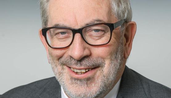 Photograph of Lord Bob Kerslake smiling
