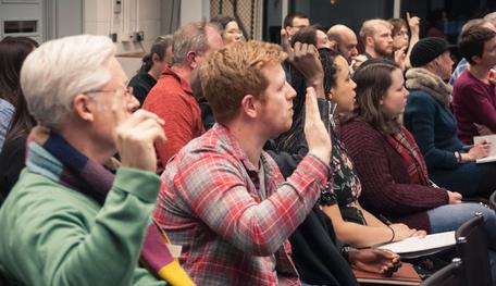 Audience asking questions during a talk at Sheffield Theatres