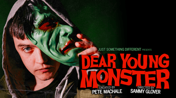 Text reads: 'Just Something Different presents Dear Young Monster/ Created by Pete Machale. Directed by Sammy Glover. A man is on the left hiding behind a green mask.