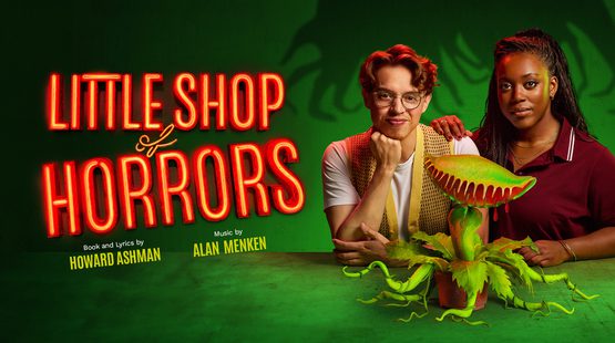 Against a dark green background, two people stand behind a green plant with tentacle-like leaves and fronds in the shape of a mouth with teeth. In luminous orange, text reads: LITTLE SHOP OF HORRORS.