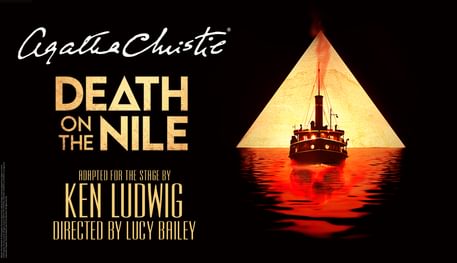 Promotional artwork for Agatha Christie's Death on the Nile. On a black background the front a steamboat is pictured in front of a pyramid on red coloured water with a skull underneath.