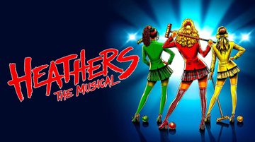 Promotional image for Heathers featuring an illustration of three girls, all facing away from the camera. On the left there is a girl holding a green croquet mallet. She is wearing a green fitted blazer and a short skirt. She has black mid length hair. In the middle there is a girl wearing a red fitted blazer and a red chequered short skirt. She has long wavy blonde hair. She is holding a red croquet mallet. On the right there is another blonde woman. She is wearing a yellow fitted blazer and yellow and white striped short skirt.. She has shoulder length wavy hair. She is also holding a yellow croquet mallet. There is a croquet ball by each of their feet.