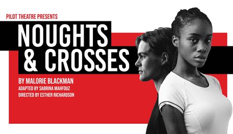 Promotional image for Noughts and Crosses featuring a young woman standing back to back with a young man against a red and white background.
