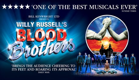 Promotional image for Blood Brothers featuring a city sky line and the brothers holding hands as if in an arm wrestle. Below this a production shot shows Mrs Johnstone crouched next to her son's singing Tell Me It's Not True.