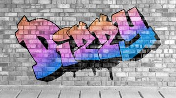 Against a grey brick wall, text reads: DIZZY in bubbly, pink graffiti.