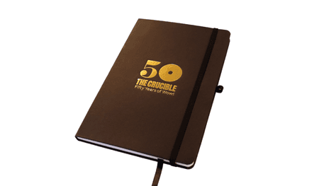 Black notebook with gold foil 50 logo