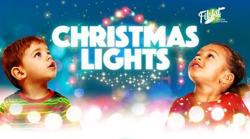 Text reads: 'Christmas Lights by Filskit theatre company'. There is an outline of a house behind the text made out of Christmas lights. There are two toddlers underneath the text who are looking up at the title. There are small lights behind them.