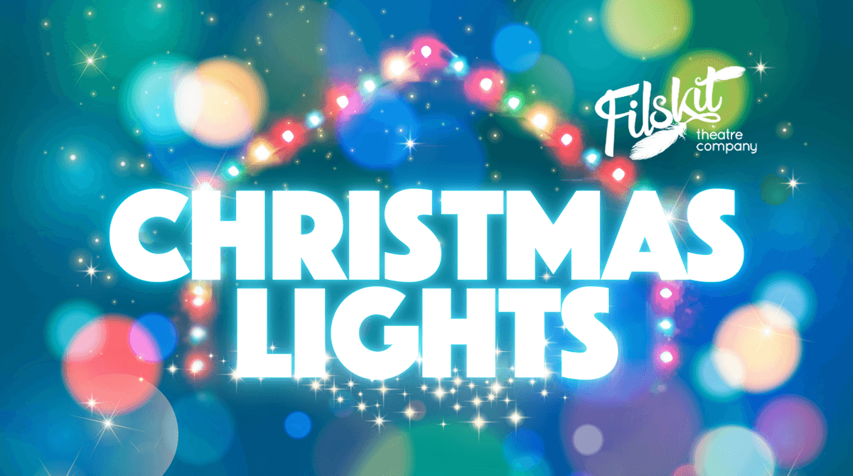 Text reads: 'Filskit Theatre Company's Christmas Lights'. There is an outline of a house behind the text made out of Christmas lights.
